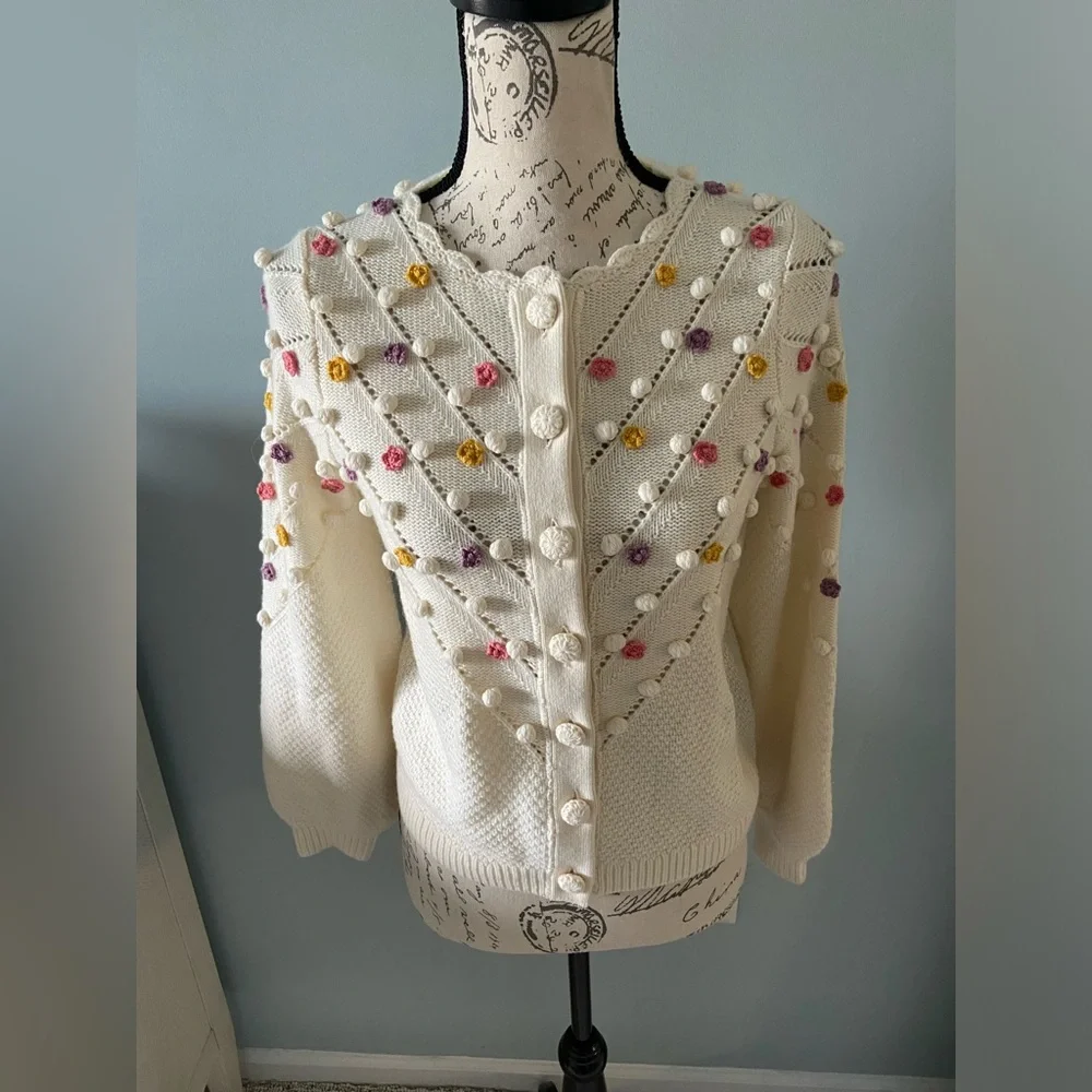 Sezane cream knit crew neck sweater with pink/purple/yellow knit flowers sz XXS